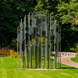 The Lost Generation sculpture stands at the center of the garden.