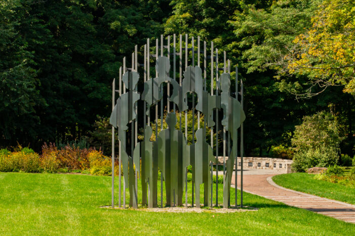 The Lost Generation sculpture stands at the center of the garden.